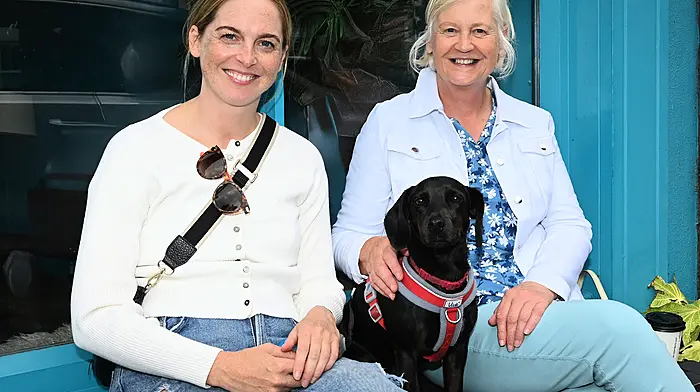 Mary Cahill with her daughter Alice and dog \