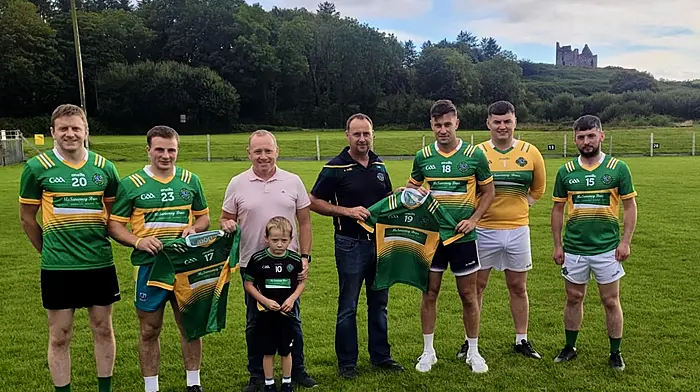 The McSweeney Bros ,Aidan, Aaron and Colm, presented a new set of championship jerseys to the Randall Og hurling and football teams represented in this photo by Ian Crowley, Sean Daly, Barry O'Driscoll, Ciaran Murray, and Eoin Murray.