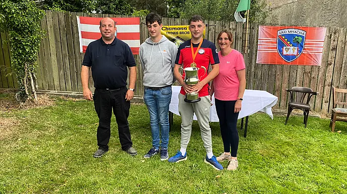 Shane Crowley who was crowned the U18 All Ireland Road Bowling Champion last weekend in Keady-Tassagh Armagh, celebrated with his proud family Donal, Eoin and Catherine Crowley.