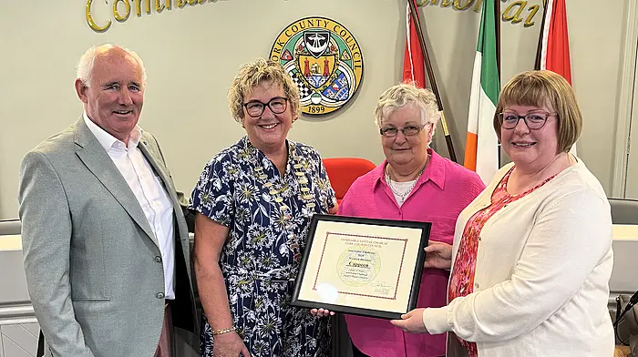 Photo shows Cllr Marie O’Sullivan making a presentation to Rose Cronin & Ann Harte, with Barry O’Sullivan.