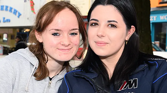 Friends Saoirse Phillips (left) from Courtmacsherry and Amy Flynn, Grange met up for a chat in Astna Square, Clonakilty. Photo: Martin Walsh.