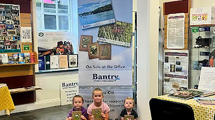 Heather Hegarty, Eve O'Sullivan and Riadh O'Sullivan presented the volunteers at Bantry Tourist Office with a bouquet of wild Montbretia and received complimentary wildflower notelets in return.