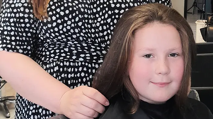 Chloe Moloney (10) from Labasheeda,  Co Clare was visiting her granny Mary McCarthy in Skibbereen for some of the summer holidays and had 16 inches of her hair cut off at Shear Influence, Skibbereen to donate to the Rapunzel Foundation, a charity that provides real-hair wigs to those who lose their hair from health conditions. Olga from Shear Influence with Chloe on the day of the haircut.