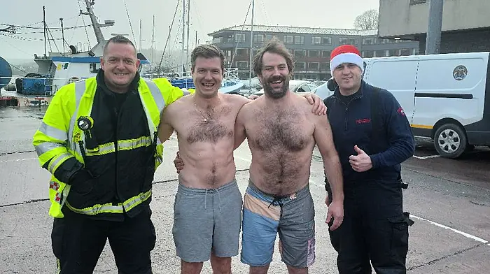 Two members of Kinsale Fire and Rescue braved the elements on Christmas Day for the annual Kinsale Lions Christmas swim. From left: Ger Butler, Cian O'Donoghue, David Quinn and sub officer Duane Steenson.