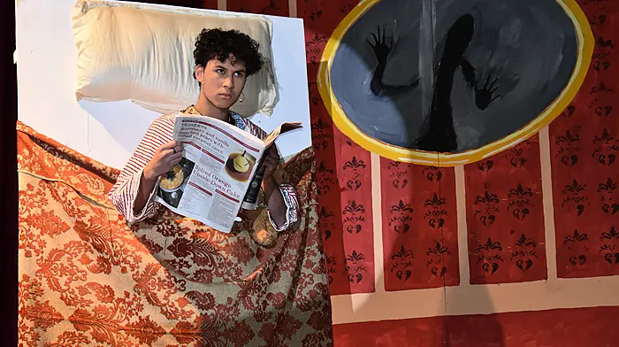 Schull Community College Transition Year student Damian Williams as Scrooge, reading a supplement from The Southern Star in the SCC panto “A Christmas Carol”
