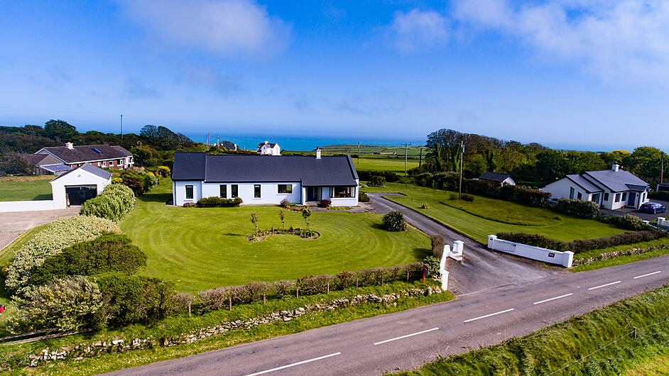 Sea views every way you turn in this pristine bungalow Image