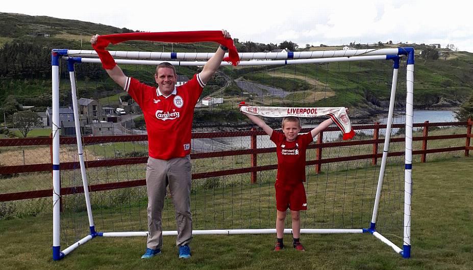 Local Liverpool supporters celebrate after long wait for title is ended Image