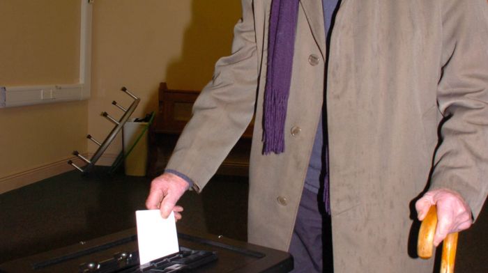 98 year old Liam O'Donovan, Skeagh casting his vote at Kilcoe National School on Saturday evening. Photo: Anne Minihane.