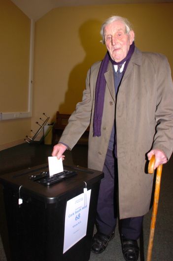 98 year old Liam O'Donovan, Skeagh casting his vote at Kilcoe National School on Saturday evening. Photo: Anne Minihane.