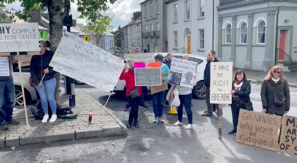 WATCH: Group protesting against masks gather outside court in Bandon Image