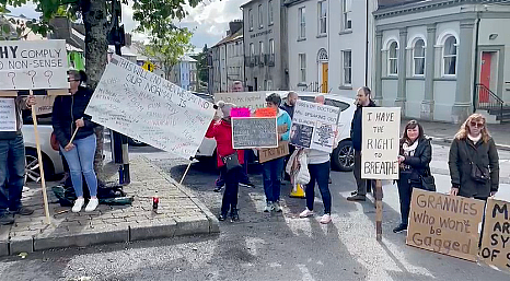 WATCH: Group protesting against masks gather outside court in Bandon Image