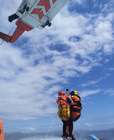 Lifeboat and helicopter rescue woman off Dursey Sound Image