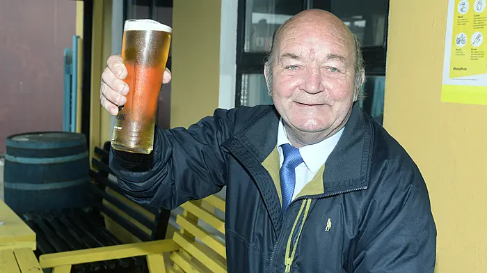 Enjoying a pint at The Stables bar at Bandon was Paddy Buckley from Crossbarry.  Left: Ray and Ken O'Callaghan. raise a glass in The Stables. (Photos: Denis Boyle)