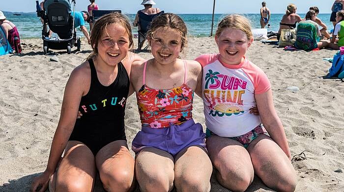 Rosscarbery, West Cork, Ireland. 22nd Jul, 2021. West Cork basked in another sweltering hot day today, with temperatures in the high 20's. The Warren Beach, Rosscarbery was packed with holiday makers. Enjoying the beach were Ava Crowley, Ahiohill and Meadhbh and Caitlin McCarthy from Rathbarry. Picture: Andy Gibson.