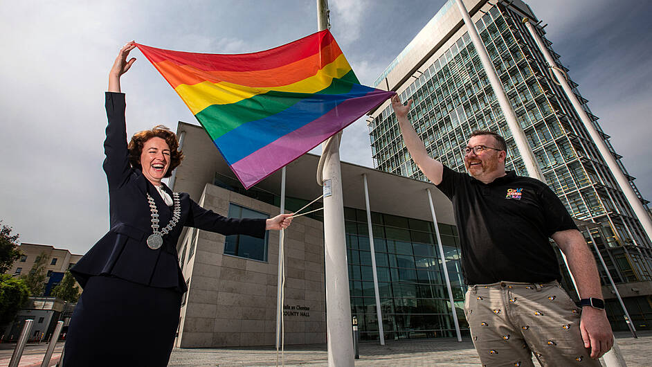 STANDING PROUD Flying high with the flag of love Image