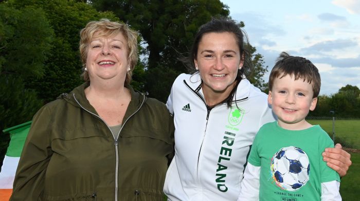 Phil Healy with Annette Spillane, who chauffered Phil through Ballineen on Saturday evening, and Annette’s grandson Adam.