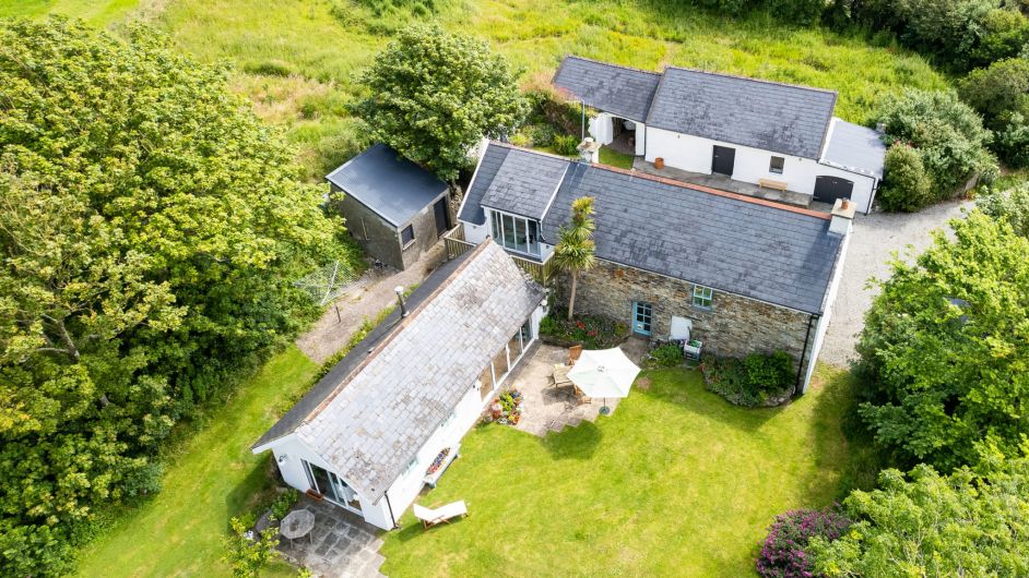 This aerial shot shows off the full potential of the property with its various outbuildings, all of which are in excellent condition and suitable for a whole range of activities.