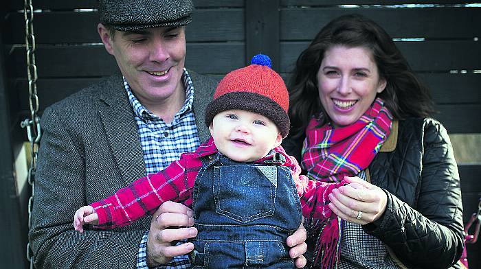 Catherine with baby Conan, who was delivered by her husband, Cllr Declan Hurley, left.