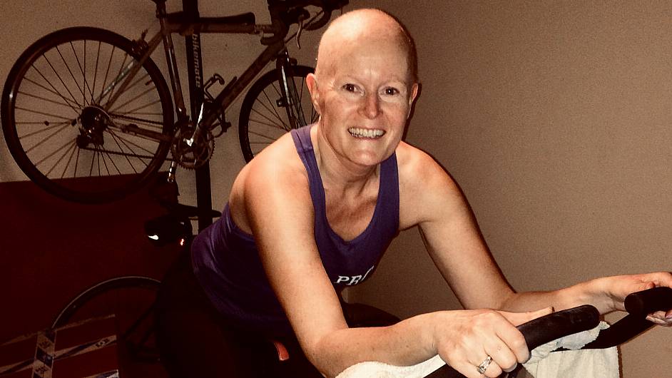 Ber Downey on her spinning bike at home, just six weeks into her treatment.