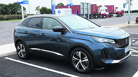 3008 PHEV is a smooth compact SUV option Image
