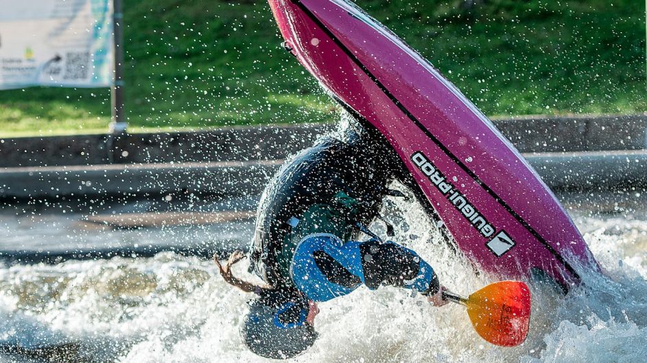 Paddling her own kayak Image