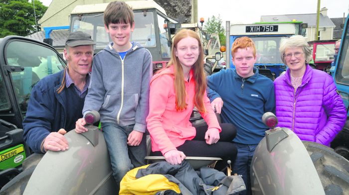 Enjoying a tractor and vintage run in Dunmanway  in aid of MS Ireland, St Mary’s Church and Co-Action West Cork were Robert, Trevor, Karen, Robbie and Annetta Ducklow from Durrus.
 (Photo: Denis Boyle)