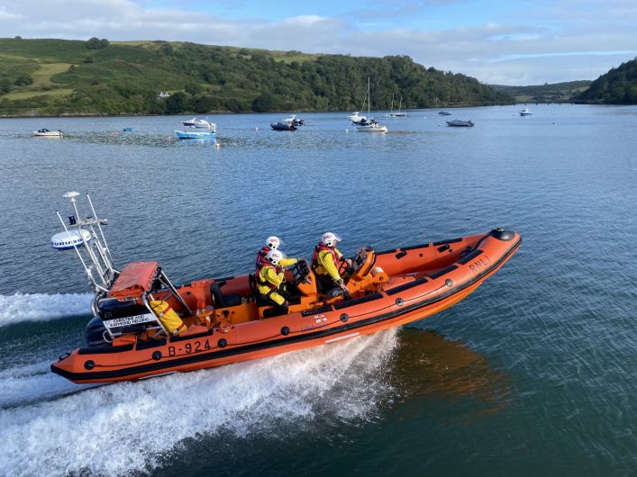 Surfer on her way to safety thanks to Coast Guard and RNLI Image