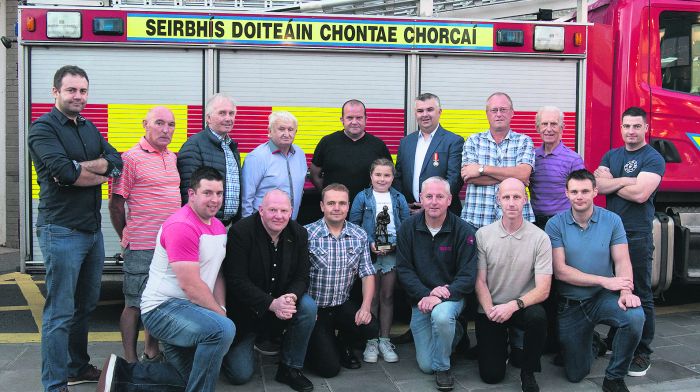 At a presentation to mark the recent retirement of Pádraig O’Reilly from Clonakilty Fire Brigade were, back, from left:  Brian Blackwell, Billy Brennan, Pakie Murphy, Johnny O’Reilly, Ronan Archbold (station officer), Pádraig O Reilly, Séamus Daly, Frank Regan and Martin Hurley. Front, from left: Mike Griffin, Fergal Ryan, (driver mechanic) Pawel Hejn, Brendan Sutton, Anthony Regan (sub station officer) and James Casey.  Also included is Pádraig’s daughter Leah O’Reilly.(Photo: Martin Walsh)