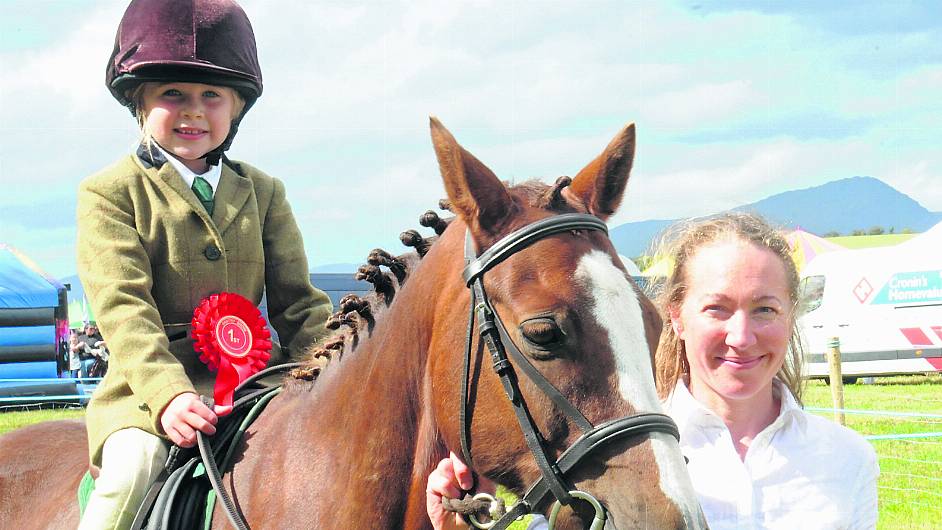 Maria Sadlier on board Oliver, led by Aoife Shields from Skibbereen, at the show.