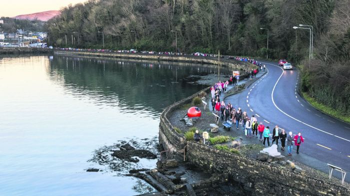 Those attending the vigil in Bantry last Sunday walking towards the Abbey graveyard where a five-minute silence was observed; Photo: Andy Gibson.