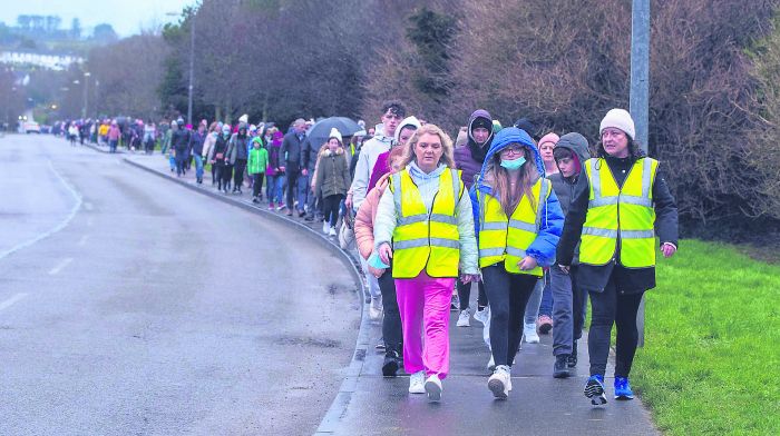 Anne O’Sullivan (right) leading Kinsale’s silent walk. 
(Photo:John Allen)