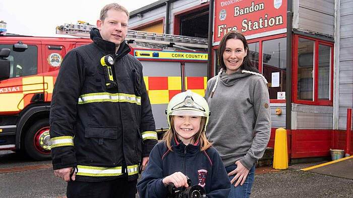 Holly wants to fight fires, - just like her dad Denis! Image