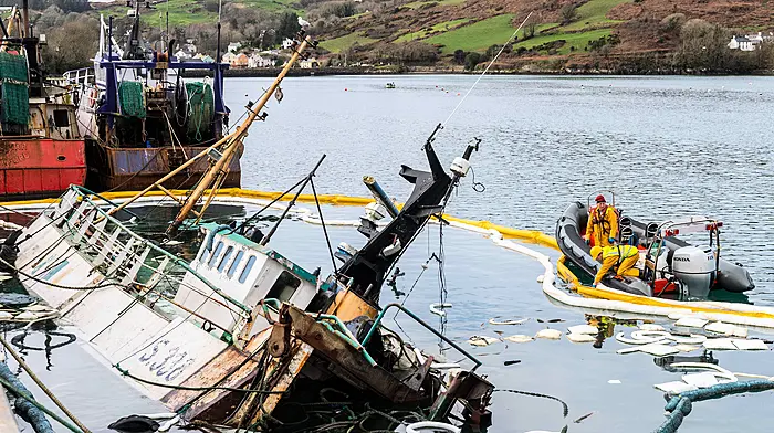 Sunken trawler under 24-hour watch to prevent fuel leakage Image