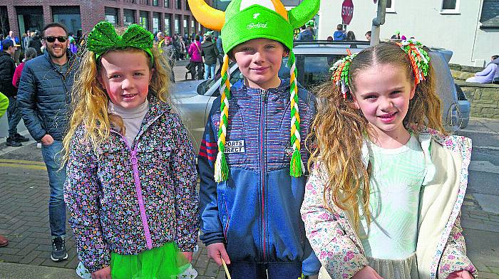 At Bandon’s parade were Mary Kate Cassidy with Arann and Alice O'Boyle. Right, 
in Dunmanway were: Emily Bayer, Sophie Mawe Downey, Ellie O Donoghue, Charley Mawe McCarthy, Melissa Duggan, Lauren Mawe Downey, Aoibhinn Gleeson, Irene Mawe, Sharon Mawe. (Photo: Denis Boyle)