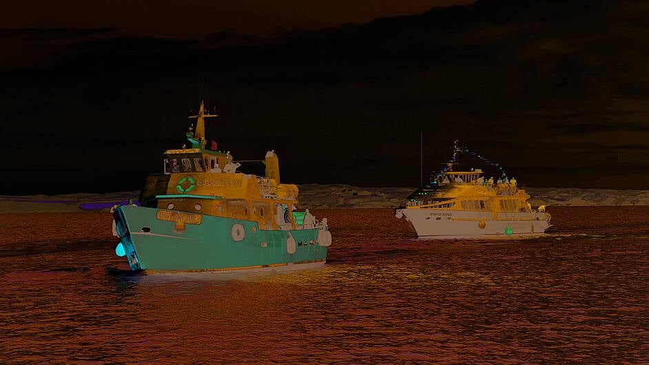 The Cape Clear ferry Dun An Oir escorting the Spirit of Doolin, which arrived from the Aran Islands on Saturday afternoon into Baltimore. 							                   (Photo: Anne Minihane)