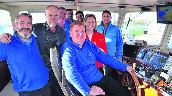 Brendan and Karen Cottrell with Seamus O’Drisceoil, Cathal Cottrell, Shane O’Driscoll, Jim Griffin, Alan O’Flynn and Pierce Hickey– owners and crew of the new Cape Clear ferry.