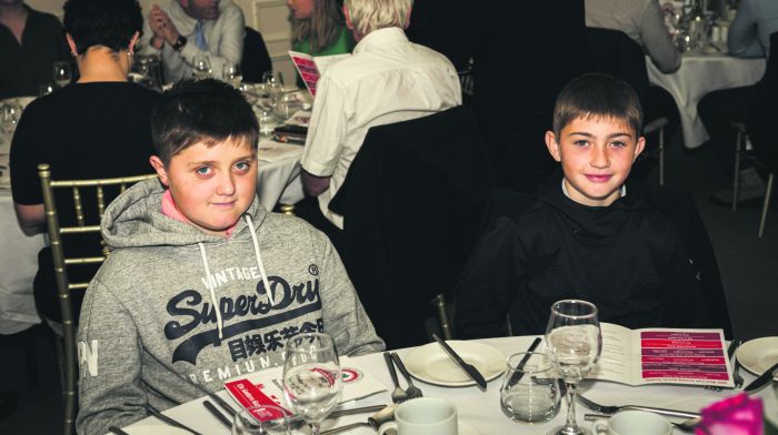 Kelvin and Laughlan Collins at the West Cork Farming Awards. Right: Padraic and Rory Coughlan at the event. (Photos: Dermot Sullivan)