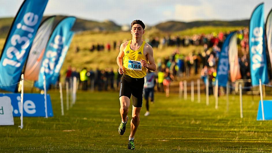 Magical McElhinney races to first national senior cross-country title Image