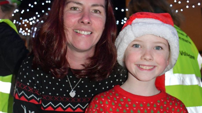 Laura and Katie Collins all dressed up to met Santa and Mrs. Claus at the switching on of Skibbereen's Christmas lights. Photo: Anne Minihane.