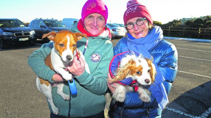 Supporting a dog walk in Inchydoney in memory of the late Clonakilty woman, Jean Lowney were Carmel O’Donovan with Woodie and Marian Cadogan with Buddy