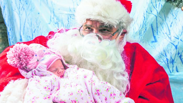 Ellie Harrington was Santa’s youngest visitor in Castletownbere at just one week. (Photo:Anne Marie Cronin)