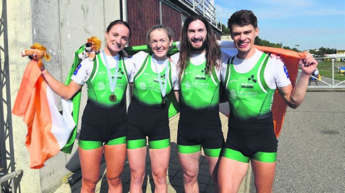 Skibbereen rowing trio Aoife Casey, Paul O’Donovan and Fintan McCarthy, and, left, Margaret Cremen from Rochestown, celebrating their medal success at the 2022 World Rowing Championships in the Czech Republic.