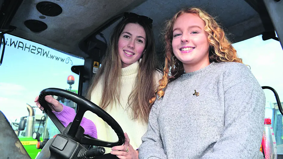 Amy Kearney and Claire Cullinane at the Ricky Barrett Memorial Tractor Run in Skibbereen last Sunday afternoon that was supported by over 400 tractors and was in aid of West Cork Palliative Care and Pieta.                             (Photo: Anne Minihane)