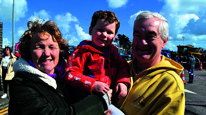 At the Ricky Barrett Memorial Tractor Run were Maura and Declan McCarthy with their grandson Fionn. (Photo: Anne Minihane)