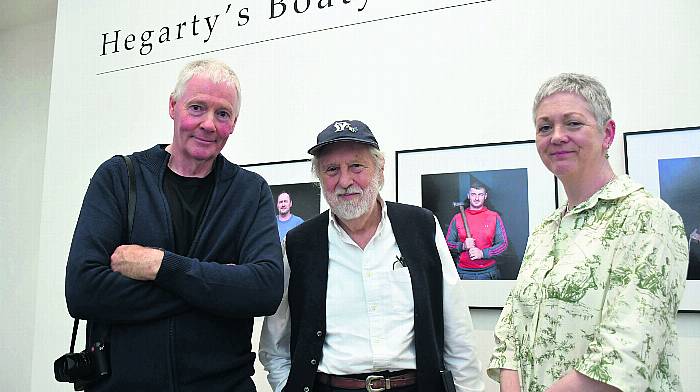 David Puttnam, who officially opened photographer Kevin O’Farrell’s exhibition ‘Hegarty’s Boatyard - Last Surviving Traditional Wooden Boatyard in Ireland’ at Uillinn West Cork Arts Centre, Skibbereen with Kevin and Ann Davoren, Uillinn director. (Photo:Anne Minihane)