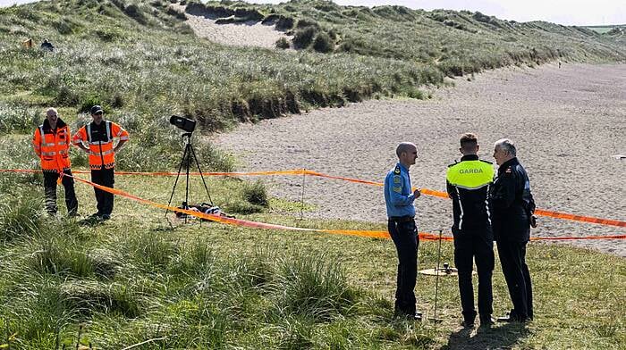 Multi-agency search for woman on Long Strand continues Image