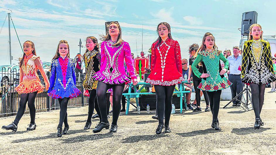 Scoil Rince Carney dancers entertaining passengers who disembarked from the cruise ship Sylvia Earl at the pier in Castletownbere: Annie O’Sullivan, Eve Hennessey, Freya Harrington, Aoife Barry, Chloe Power, Niamh Barry and Katie Downey.	 (Photo: Anne Marie Cronin)