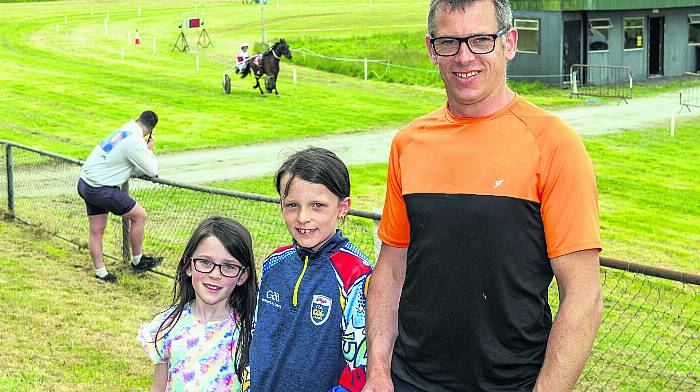 Enjoying the first harness racing of the season at Ballabuuidhe race track in Dunmanway were Farah, Ava and Vincent Healy from Dunmanway.  (Photo: Andy Gibson)