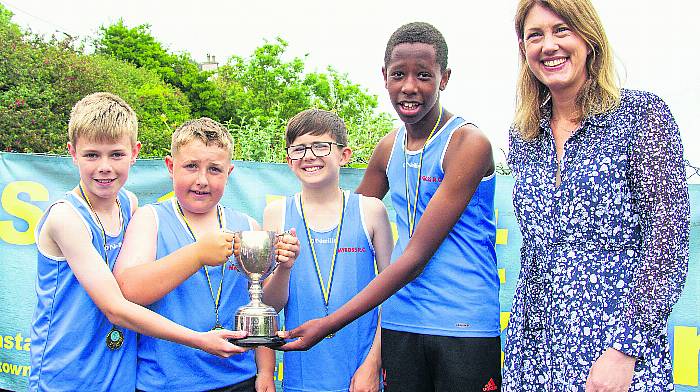 Helen Wycherley, right, representing The Celtic Ross Hotel with Jack Deasy, James Brown, Isaac Limerick, and Tamirat O’Donovan, the U12 crew with their cup and medals during the Glandore Regatta. (Photo: Andrew Harris)