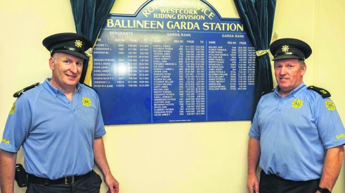 At the unveiling of a plaque to mark the 100th annversary of An Garda Síochána arriving in the village of Ballineen, erected by the West Cork Retired Garda Association, were gardaí Tadgh O'Sullivan and Michael Cadogan. The plaque shows the names of all the gardaí who have served at Ballineen station. (Photo: Andy Gibson)